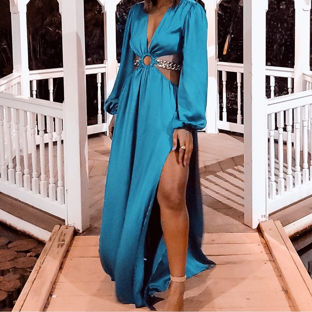 Maxi/ formal dress. Turquoise with gold detail. It Is stunning and very fashion.